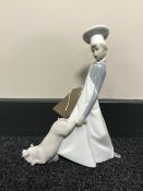 A Lladro figure - chef with pig