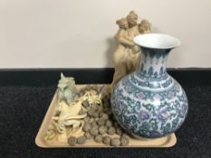 A twentieth century floral patterned china vase, chalk figure, foo dog,