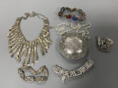 A collection of various silver pendants and bracelets (Q)