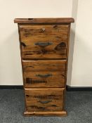 A plantation pine three drawer filing chest