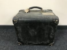 An early 20th century square luggage case