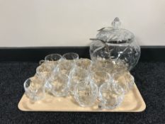 A lead crystal lidded punch bowl with twelve cups and a plated ladle