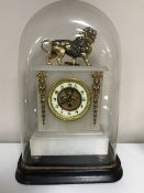 An alabaster and gilt metal mounted mantel clock,