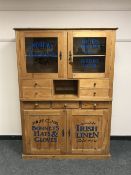 A pine multi-drawer linen cabinet 
