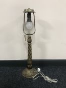 An ornate heavy brass table lamp (continental wiring)