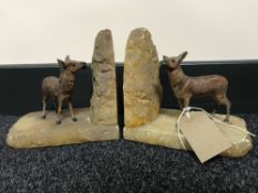 A pair of continental Art Deco deer bookends on marble bases