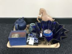 A tray of decorative blue crystal bowl, cutlery, plated goblet,