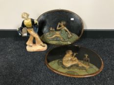 A chalk Art deco figure together with a pair of wall plaques