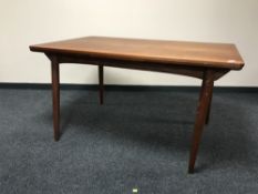 A late 20th century teak extending table