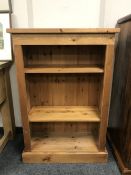 A set of pine open shelves,