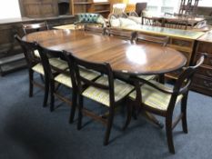 A mahogany twin pedestal Regency style dining table,