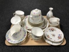 A tray of twenty one piece Minton Printemps pattern bone chine tea service,