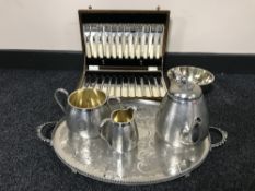 A silver plated Arthur Price twin handled serving tray, four piece plated tea service,
