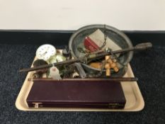 A tray of vintage hanging scales, bottle openers, weight, brass candlestick,