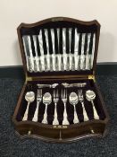 A mahogany canteen containing Viner's cutlery