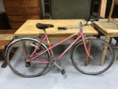 A lady's Peugeot Mystic bike