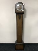 An oak granddaughter clock