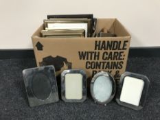 A box containing a large quantity of photograph frames