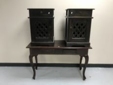 A contemporary hardwood two-drawer console table together with a pair of bedside cabinets with