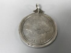 An early nineteenth century ploughing medal given by the Highland Society of Scotland to William