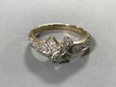 A 9ct gold diamond set ring,