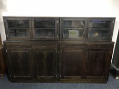 A stained pine twin section cabinet
