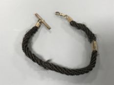 A Victorian hair Albert with gold fittings