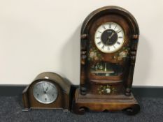 A contemporary Acctim mantle clock together with an oak Smiths clock