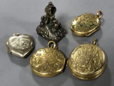 Four antique gold plated and fronted lockets together with a fob.