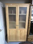 A pine double door bookcase