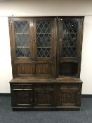 A Chapmans Siesta oak linen fold twin section cocktail display unit