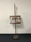 An early 20th century double sided music stand
