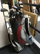Two golf bags containing golf clubs,