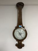 A carved mahogany banjo barometer