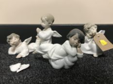 Four Lladro figures - cherubs (a/f)