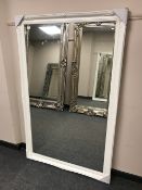 A white Victorian style overmantel,