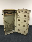 An early 20th century large vellum travelling wardrobe