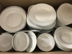 A quantity of white catering dinner ware, storage jars, sundae dishes, Pyrex oven dishes,