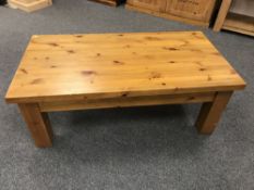 A pine low coffee table,