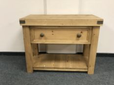 A reclaimed pine butcher's block fitted a drawer,