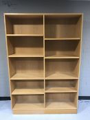 A set of oak effect open shelves