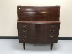 A mid 20th century mahogany bureau