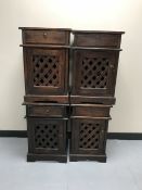 Four contemporary hardwood bedside cabinets with lattice doors