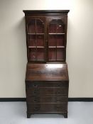 A mahogany Regency style bureau bookcase