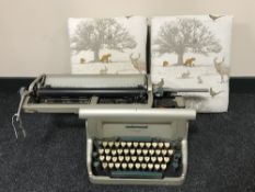 An Underwood Golden Touch typewriter and two footstools