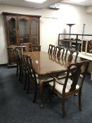 A ten piece walnut dining room suite - display unit,