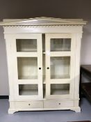 An antique pine painted pantry cabinet
