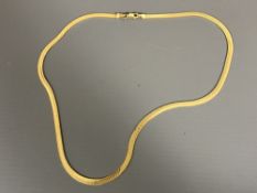 A 9ct gold necklace, 9.