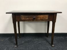 An antique hall table on pad feet