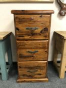 A plantation pine three drawer filing chest